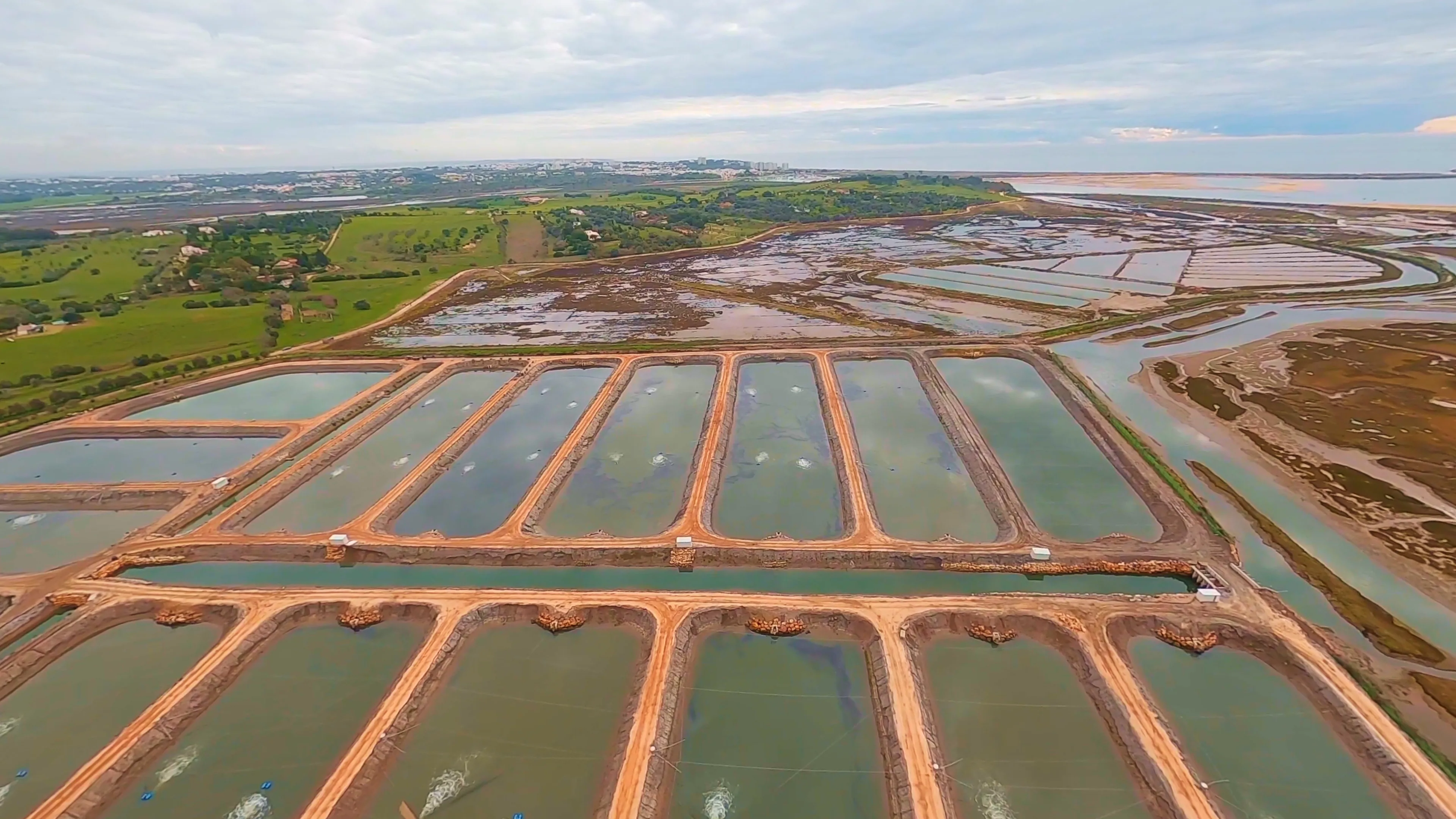 Aerial view of NaturaFish estuary ponds at Ria de Alvor in Portugal's Algarve